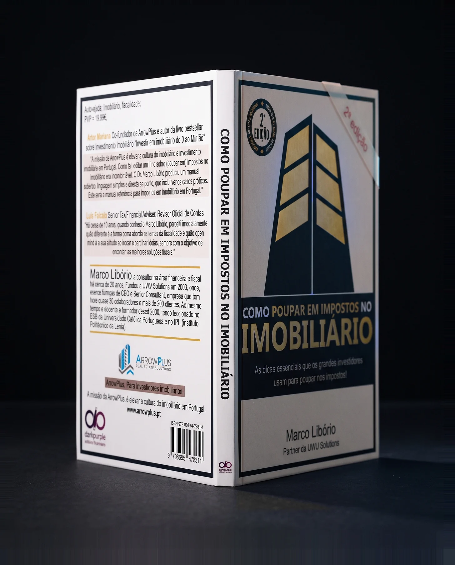 O livro aberto em V, com a lombada à frente
